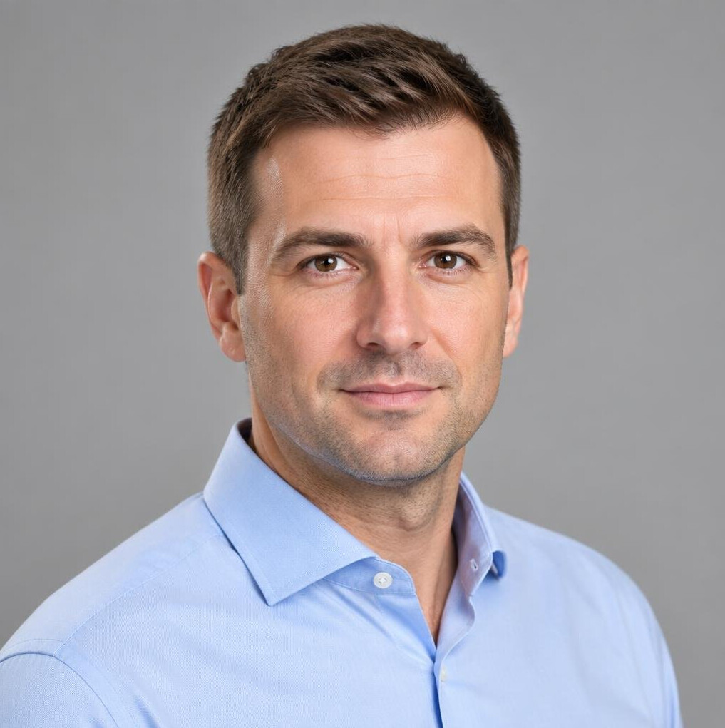 Portrait of a man in a collared shirt